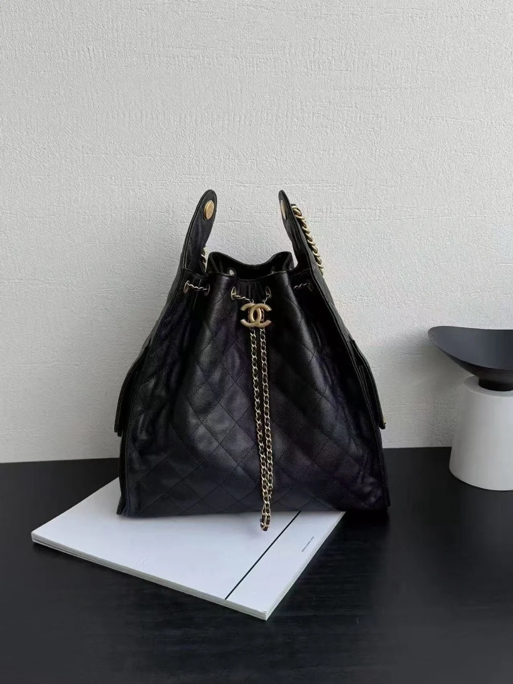 CHANEL Black Quilted Leather Drawstring Chain Bucket Bag